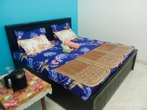 Letto o letti in una camera di Maa vaishno paying guest house