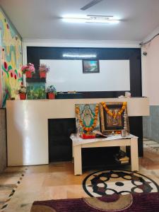 Ruang duduk di Om Shakthi Suits