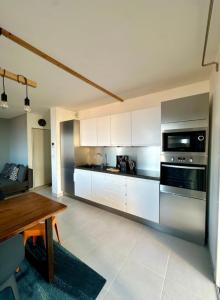 Η κουζίνα ή μικρή κουζίνα στο ALOES Appartement T3