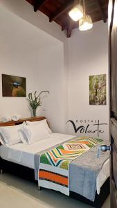 Postel nebo postele na pokoji v ubytování Volarte Hostal + 37 fotografií