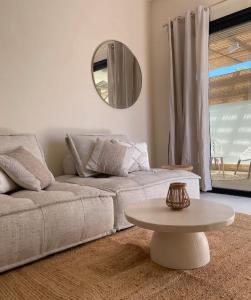 Posezení v ubytování L'essentiel Home By Chloé