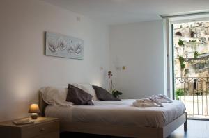 Voodi või voodid majutusasutuse La Scala Suite toas