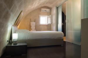Voodi või voodid majutusasutuse La Scala Suite toas