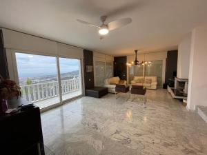 a living room with a view of a living room at House Seaviews Barcelona 22Km in Cabrils +46 photos