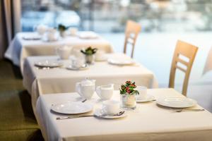 Restoran või mõni muu söögikoht majutusasutuses Garni Larix