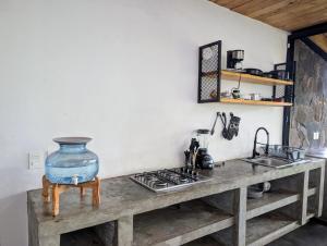 Kuchyň nebo kuchyňský kout v ubytování Cabaña La Finca Mazamitla