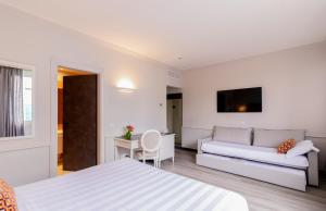 Lova arba lovos apgyvendinimo įstaigoje Parco dei Principi Boutique Hotel