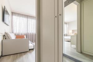 Lova arba lovos apgyvendinimo įstaigoje Parco dei Principi Boutique Hotel