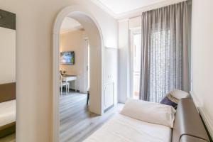 Lova arba lovos apgyvendinimo įstaigoje Parco dei Principi Boutique Hotel