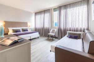 Lova arba lovos apgyvendinimo įstaigoje Parco dei Principi Boutique Hotel