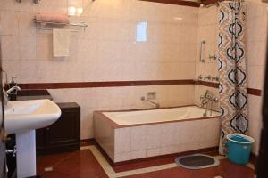 Koupelna v ubytování Banyan Grove + 66 fotografií