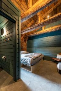 Postel nebo postele na pokoji v ubytování ÖBois Charlevoix - L'Écurie 1 Studio