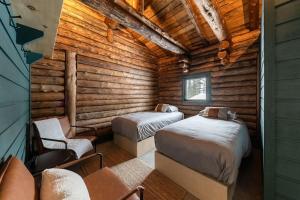 Postel nebo postele na pokoji v ubytování ÖBois Charlevoix - L'Écurie 1 Studio