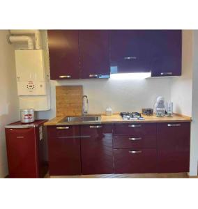 Η κουζίνα ή μικρή κουζίνα στο Mangia, leggi, dormi