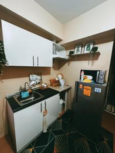 Kuchyň nebo kuchyňský kout v ubytování Comfy Sanctuary