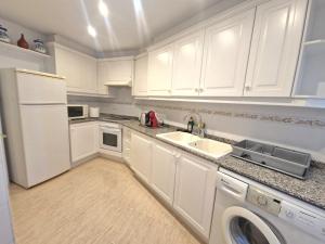 Η κουζίνα ή μικρή κουζίνα στο Apartamento Apolo XII