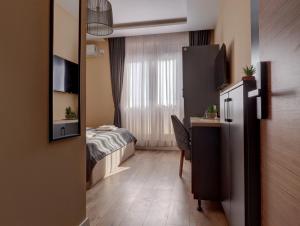 Kuchyň nebo kuchyňský kout v ubytování Midtown Prishtina Stays