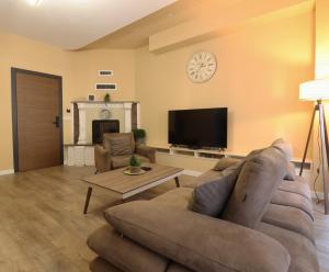 TV a/nebo společenská místnost v ubytování Midtown Prishtina Stays