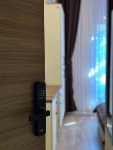 TV a/nebo společenská místnost v ubytování Midtown Prishtina Stays
