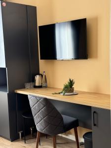 TV a/nebo společenská místnost v ubytování Midtown Prishtina Stays