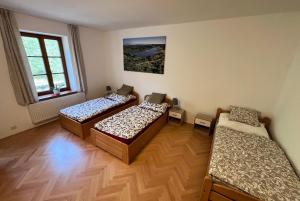 Postel nebo postele na pokoji v ubytování Stará Škola