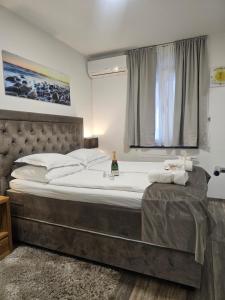Postel nebo postele na pokoji v ubytování Villa Agram