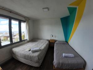 Postel nebo postele na pokoji v ubytování Temiscira Hostel