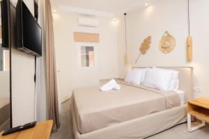 Postel nebo postele na pokoji v ubytování Ionas Apartments 6