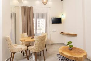 TV a/nebo společenská místnost v ubytování Ionas Apartments 6