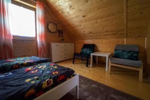 Posteľ alebo postele v izbe v ubytovaní Nowe domki w górach "Pod Skrzycznym", koło Szczyrku