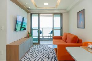 Et opholdsområde på Apartamento Beira Mar Boa Viagem