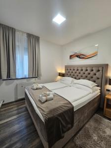 Postel nebo postele na pokoji v ubytování Villa Agram