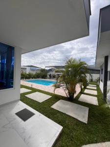 a view of a swimming pool from a house at Compostela Cabañas Gigante in Gigante +16 photos