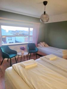 Grindavik Guesthouse self check in & outにあるベッド