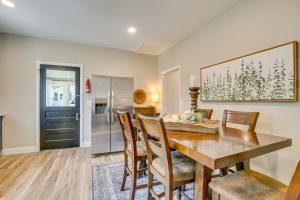 a dining room with a table and chairs at Vino Villa Wine Country Gem Patio and Grill in Defiance