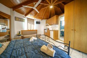 Kuchyň nebo kuchyňský kout v ubytování RODI BLUE apartments