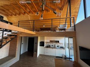 an open kitchen and dining room of a house at Vita Abies in Vodice