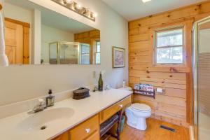 a bathroom with a sink and a toilet at Stunning Gore Vacation Rental on 10 Acres of Land! in Gore +24 photos