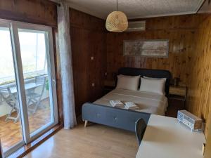 Posteľ alebo postele v izbe v ubytovaní Sea View Roof Garden