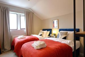 Ένα ή περισσότερα κρεβάτια σε δωμάτιο στο 11 beds, 2 properties combined, M1, M62, Free parking +17 φωτογραφίες