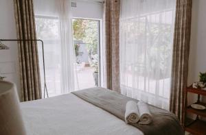 Katil atau katil-katil dalam bilik di Zhantique Guest House 1- Unit 2