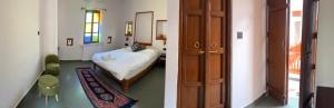 Postel nebo postele na pokoji v ubytování Hari Niwas Guest House