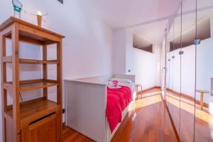 Postel nebo postele na pokoji v ubytování Lugano Panoramica - Happy Rentals