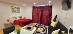 a living room with a bed and a couch at Grace Studio in London