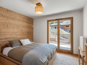 Postel nebo postele na pokoji v ubytování Le Theleme A201