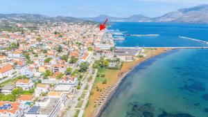 an aerial view of a city and the beach at Boutique Villa Aspasia in Lixouri
