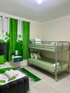 Postel nebo postele na pokoji v ubytování Hotel Mi Dulce Amanecer PyR