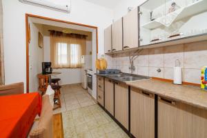 Kuchyňa alebo kuchynka v ubytovaní Apartments Zvonimir