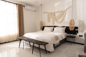 Voodi või voodid majutusasutuse Cove Fehendhoo toas