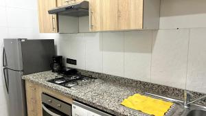 Dapur atau dapur kecil di Appart Prestige au Centre de Rabat Luxe & Confort